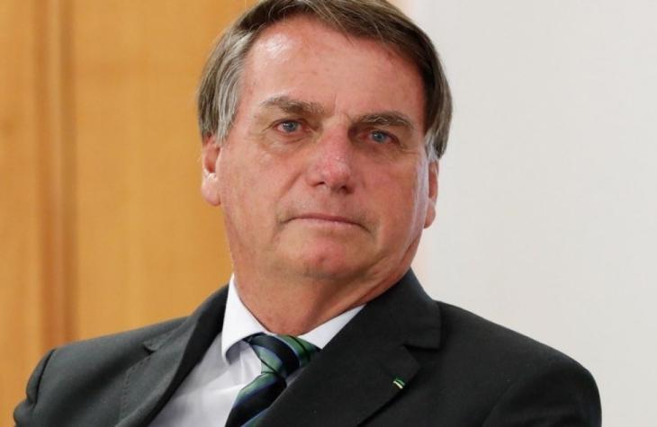 Bolsonaro diz que Brasil tem "dado certo", apesar de momento crítico na saúde